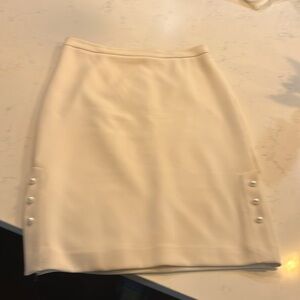 Ann Taylor cream pencil skirt fully lined.